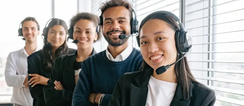 Customer service team with headsets ready to help
