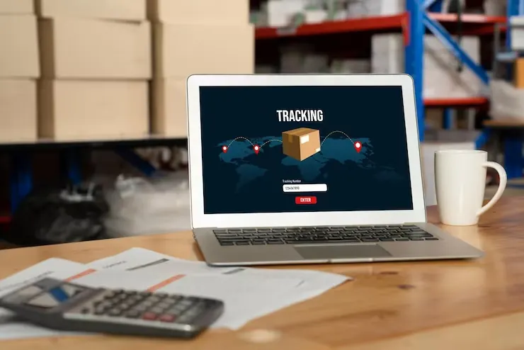 Booking and tracking shipments online on a laptop